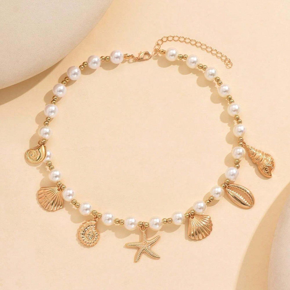 Ocean Soul Necklace – Pearl-Inspired Pendant with Starfish & Turtle Charms