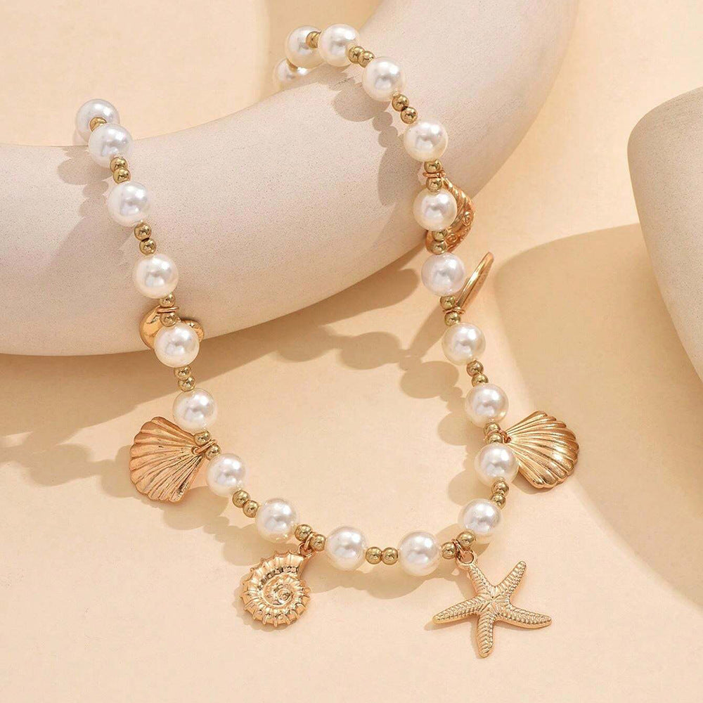 Ocean Soul Necklace – Pearl-Inspired Pendant with Starfish & Turtle Charms