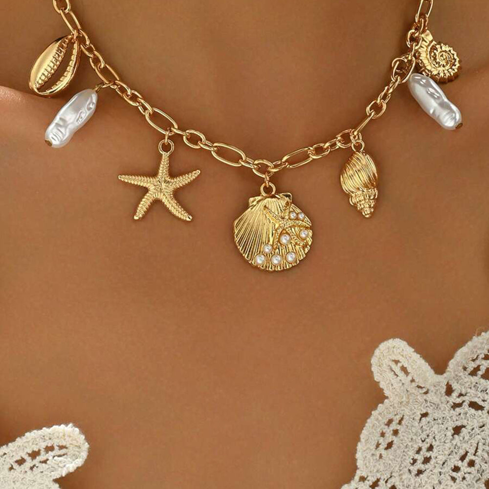 Ocean Soul Necklace – Pearl-Inspired Pendant with Starfish & Turtle Charms
