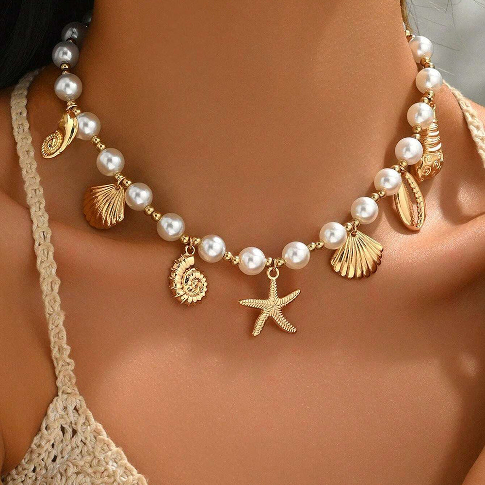 Ocean Soul Necklace – Pearl-Inspired Pendant with Starfish & Turtle Charms