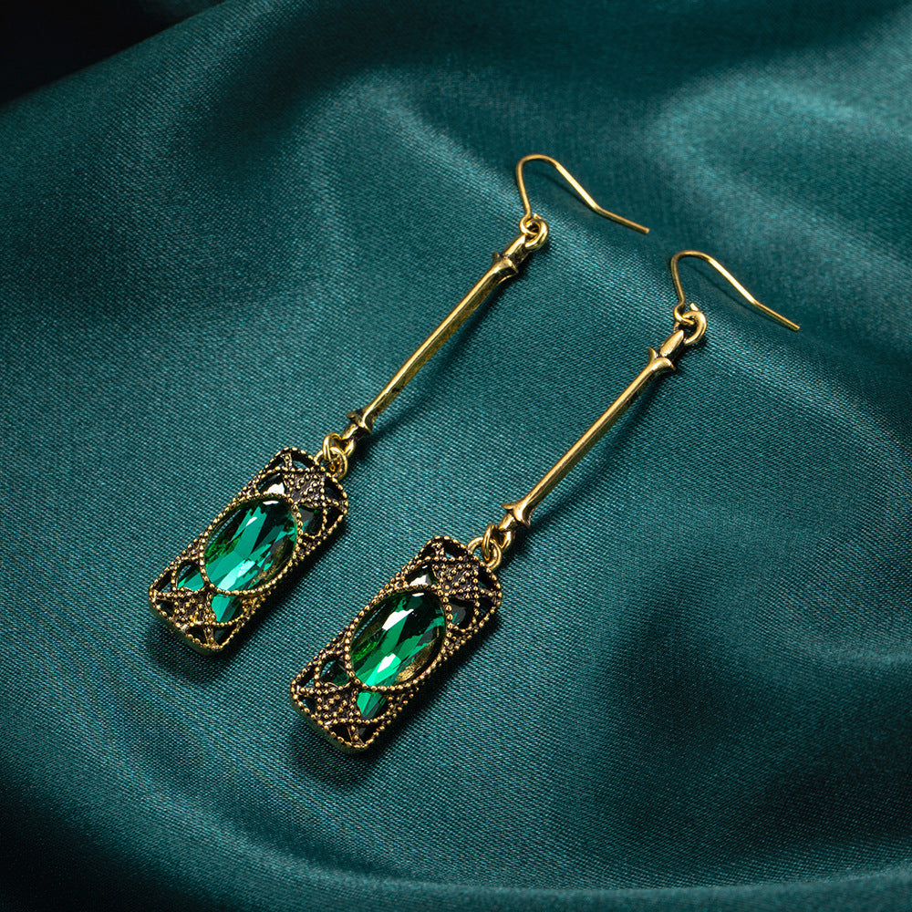 Emerald Elegance – Long Tassel Drop Earrings
