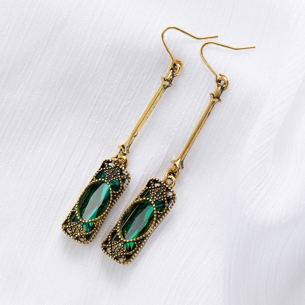 Emerald Elegance – Long Tassel Drop Earrings