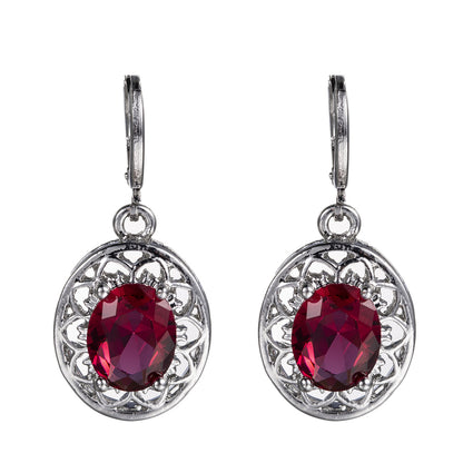 Sacred Bloom – Egg Crystal Earrings & Hollow Petal Pendant Necklace