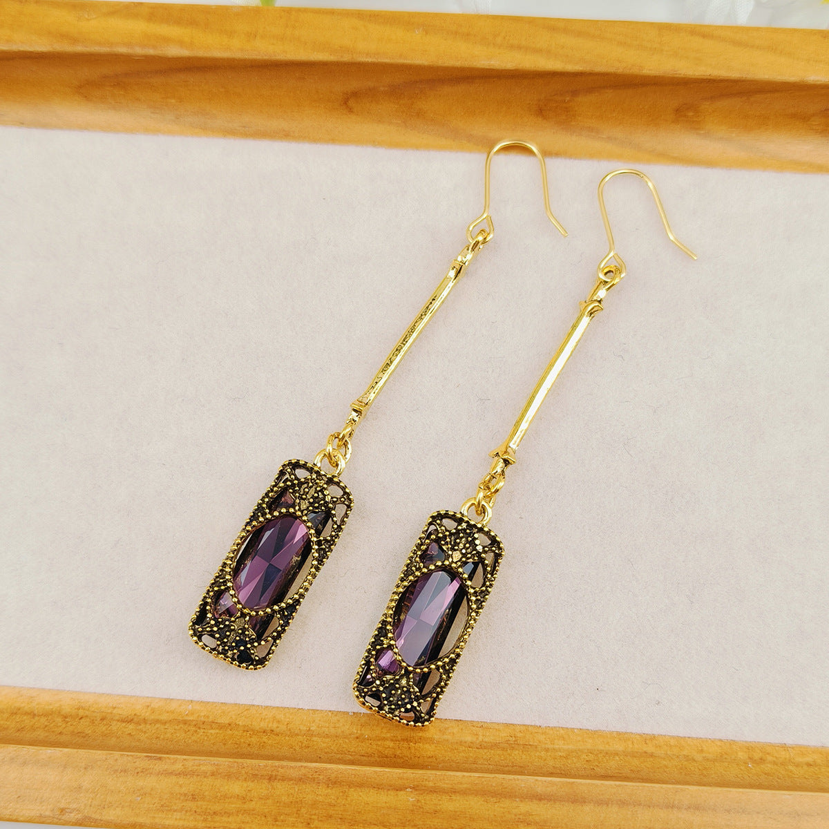 Emerald Elegance – Long Tassel Drop Earrings