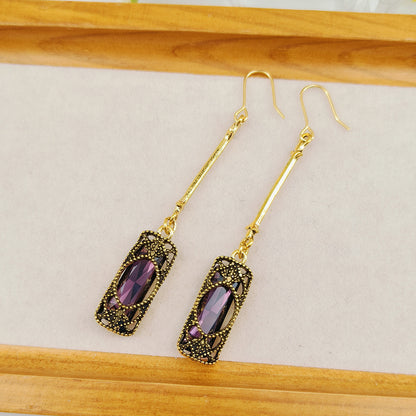 Emerald Elegance – Long Tassel Drop Earrings