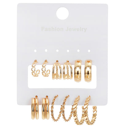 Elegance in Nine – Pearl & Butterfly Stud Earrings Set