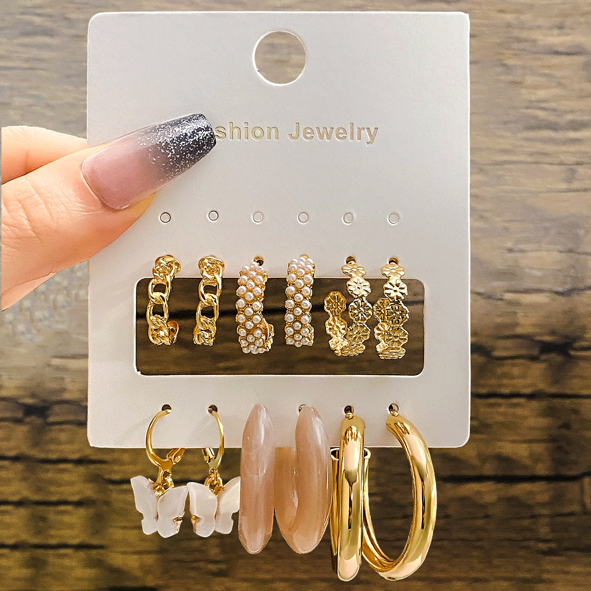 Elegance in Nine – Pearl & Butterfly Stud Earrings Set