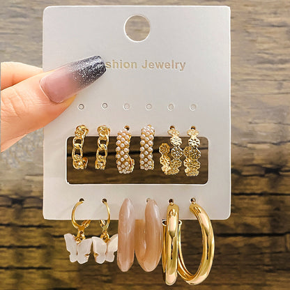 Elegance in Nine – Pearl & Butterfly Stud Earrings Set