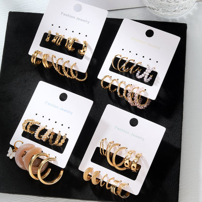 Elegance in Nine – Pearl & Butterfly Stud Earrings Set