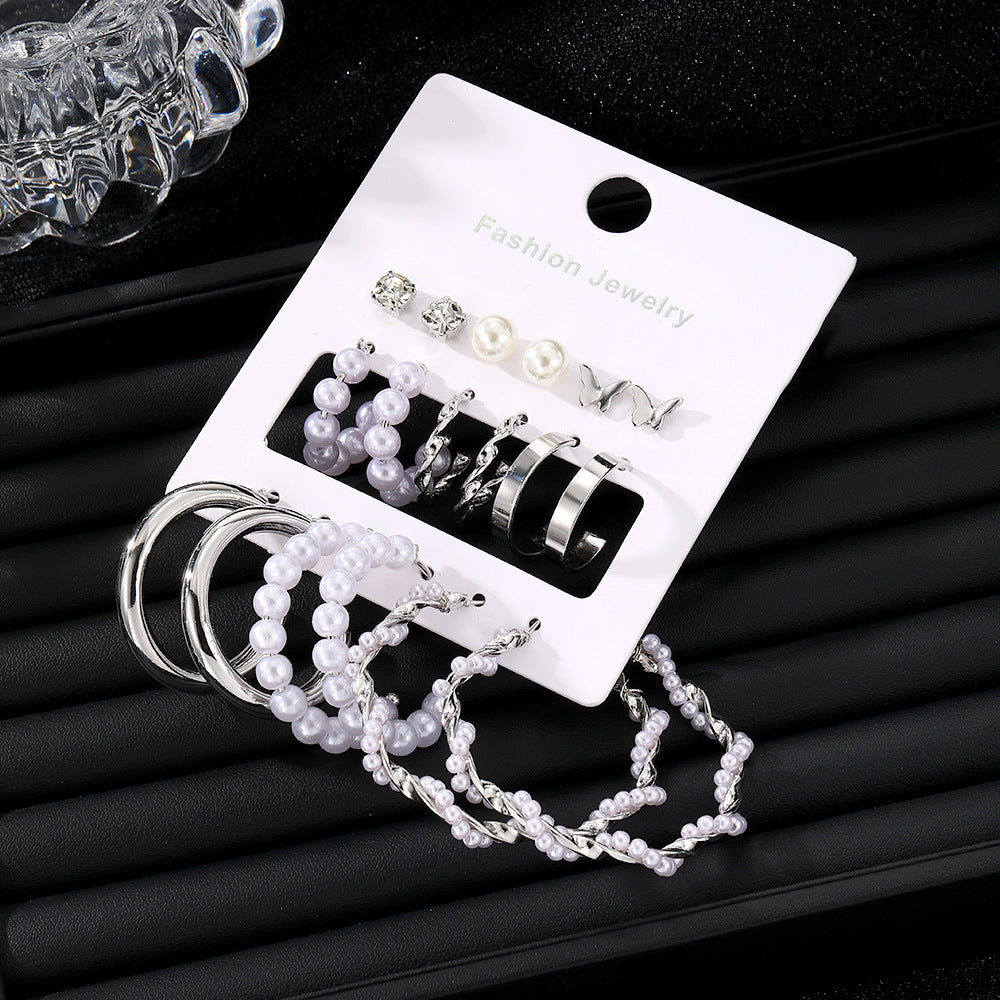 Elegance in Nine – Pearl & Butterfly Stud Earrings Set