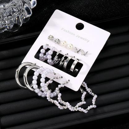 Elegance in Nine – Pearl & Butterfly Stud Earrings Set