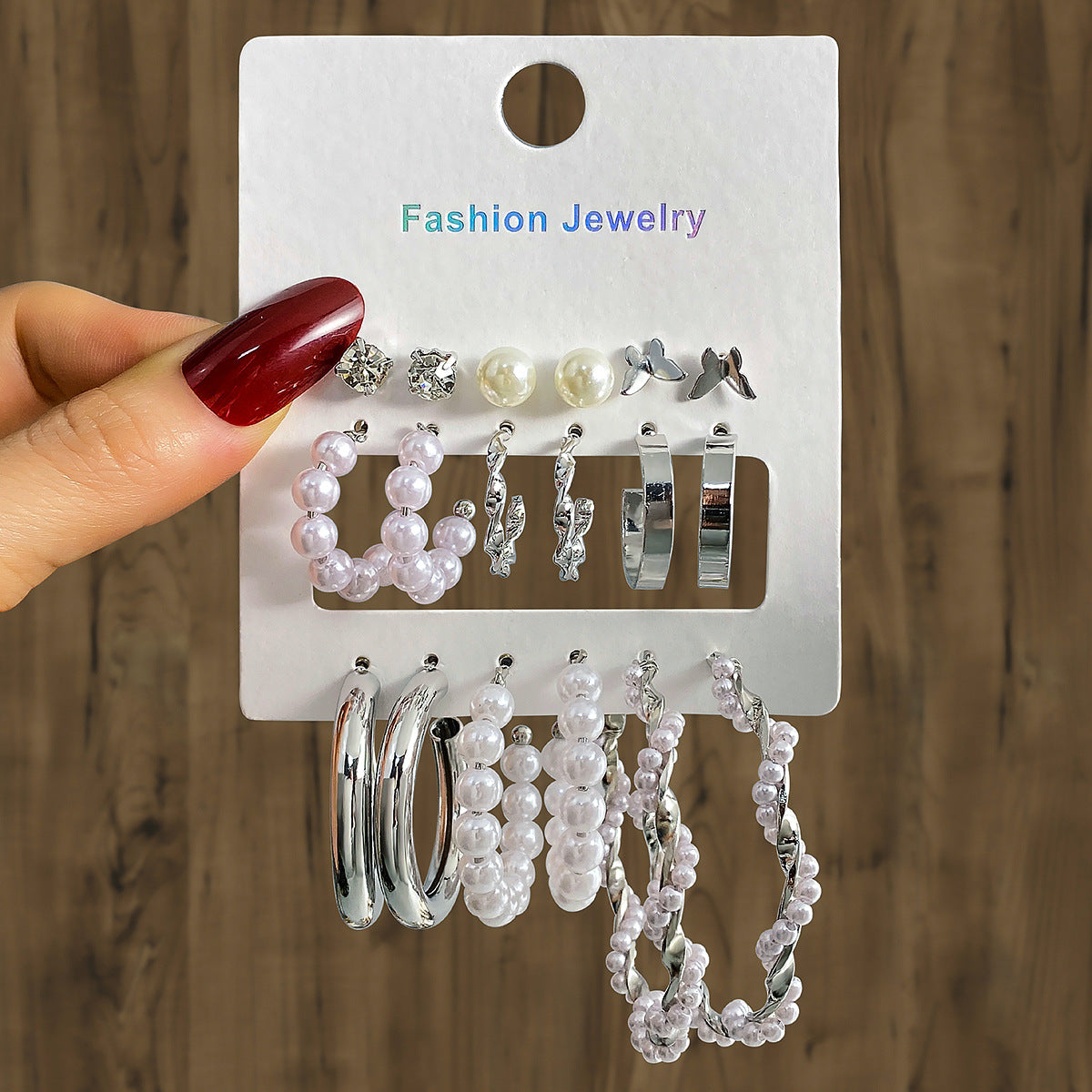 Elegance in Nine – Pearl & Butterfly Stud Earrings Set