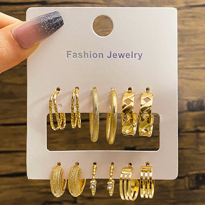 Elegance in Nine – Pearl & Butterfly Stud Earrings Set