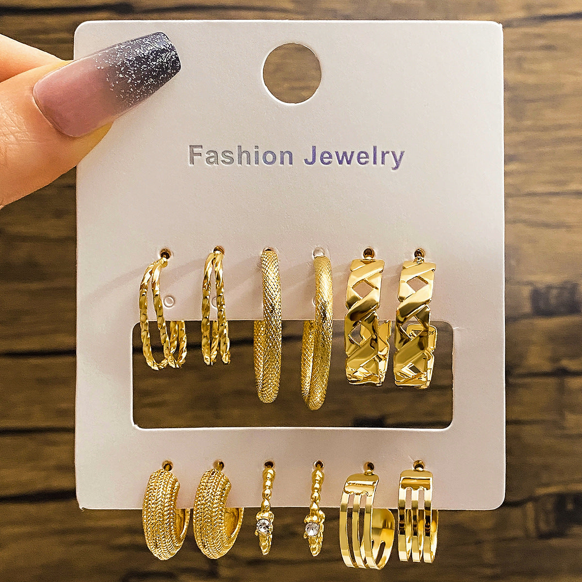 Elegance in Nine – Pearl & Butterfly Stud Earrings Set